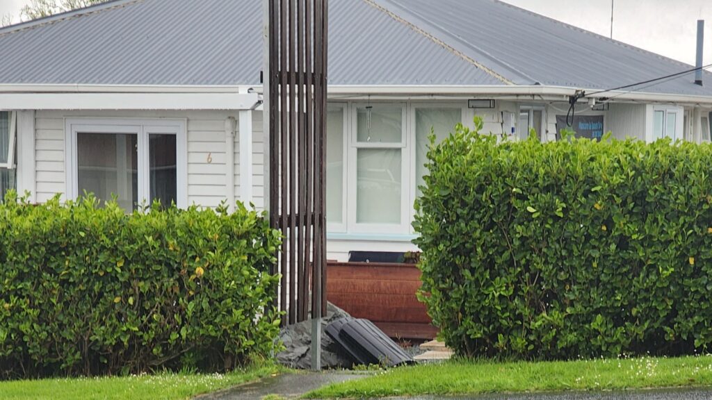 Salon is in a white weatherboard building with a grey iron roof